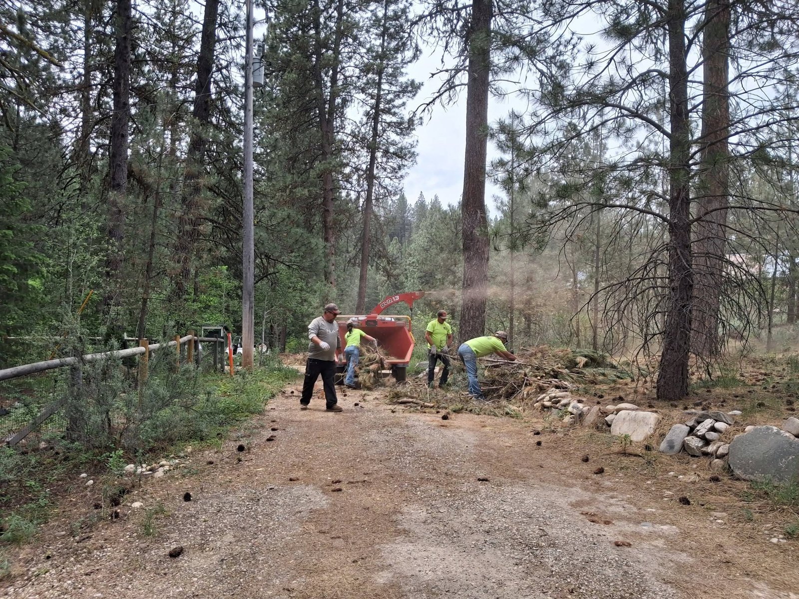 Feeding the chipper on a back road.